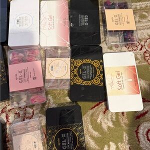 15 boxes of various Aprés Gel-X soft gel extensions